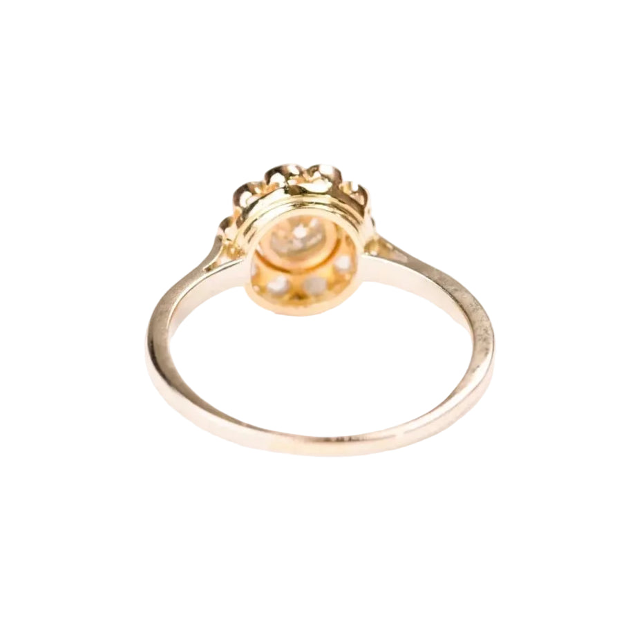 Bague marguerite ancienne diamants en or deux tons et platine - Castafiore