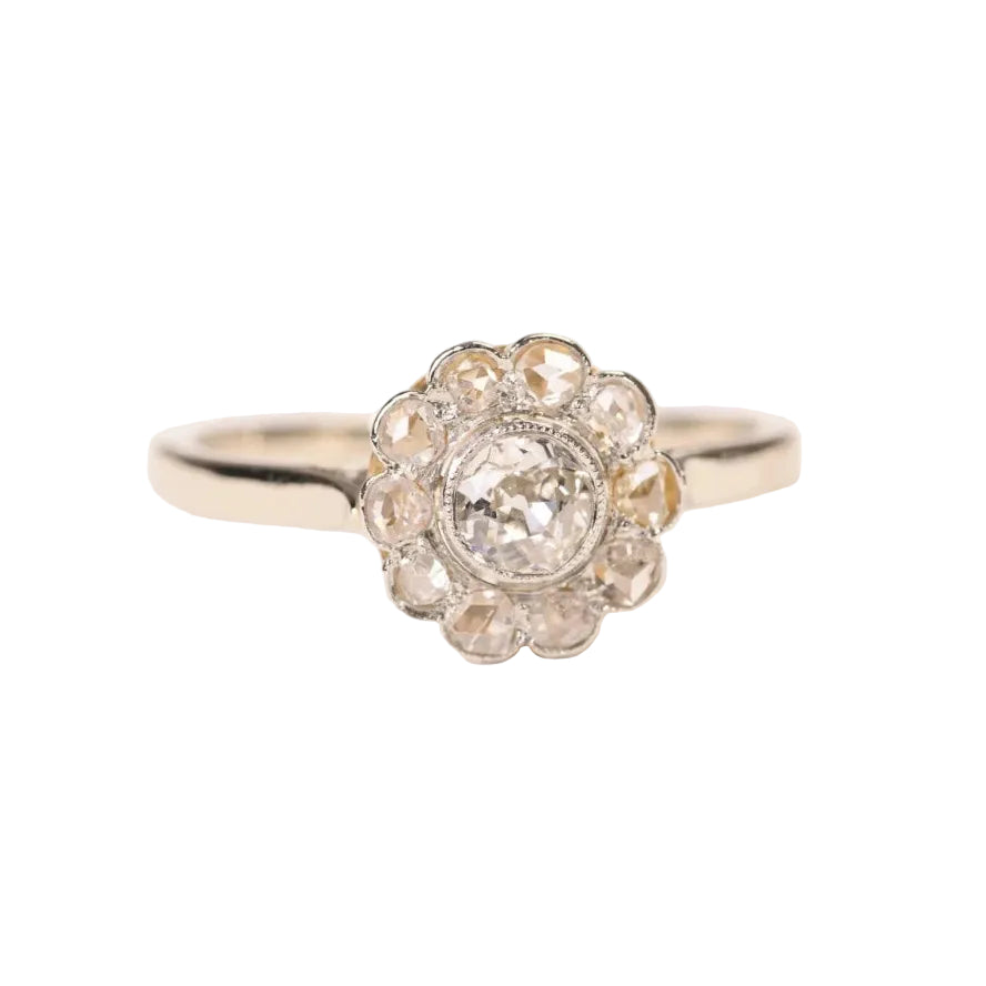 Bague marguerite ancienne diamants en or deux tons et platine - Castafiore