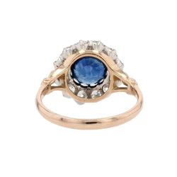 Bague marguerite ancienne en or rose et platine avec saphir et diamants - Castafiore