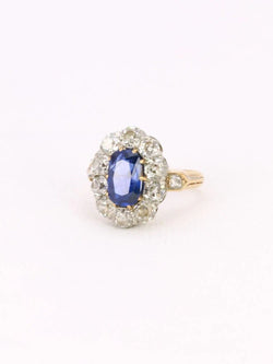 Bague Marguerite ancienne or rose, saphir et diamants - Castafiore