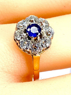 Bague marguerite en or 18 carats, saphir et diamants - Castafiore
