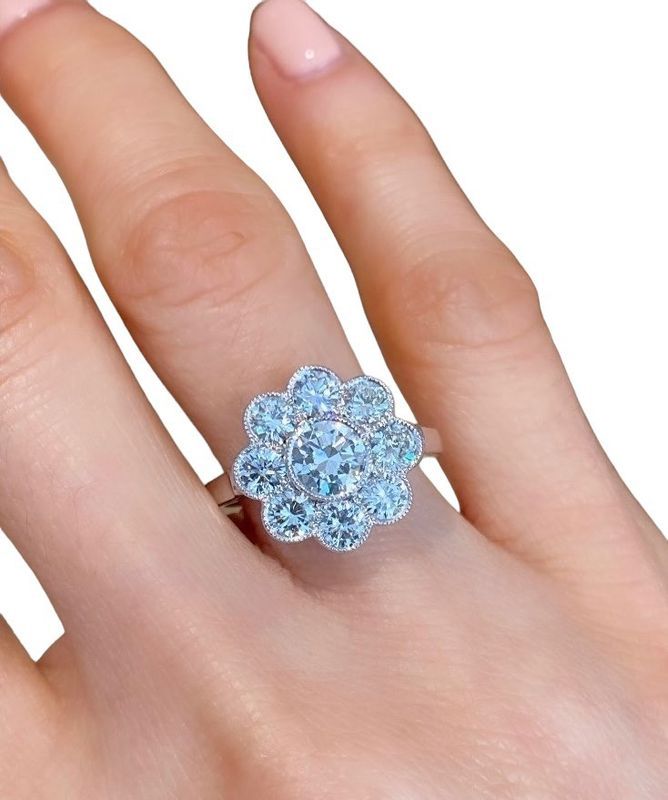 Bague Marguerite, en or blanc 18k et diamants