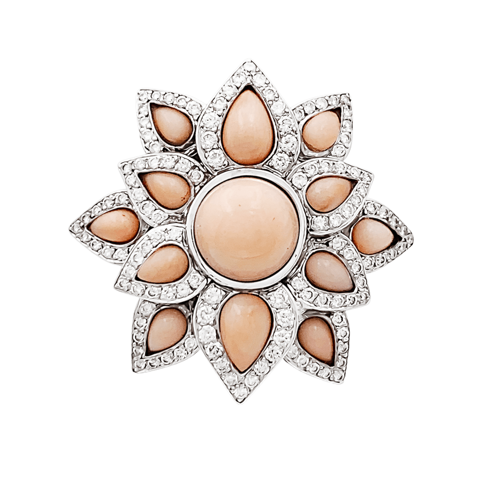 Ring flower, white gold, diamonds and angel-skin coral.