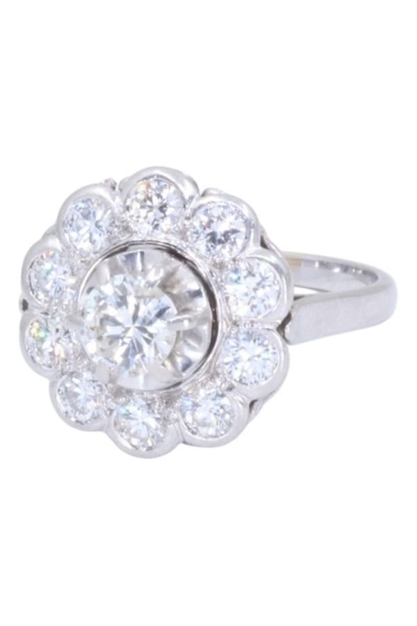 Bague marguerite en or blanc et diamants - Castafiore