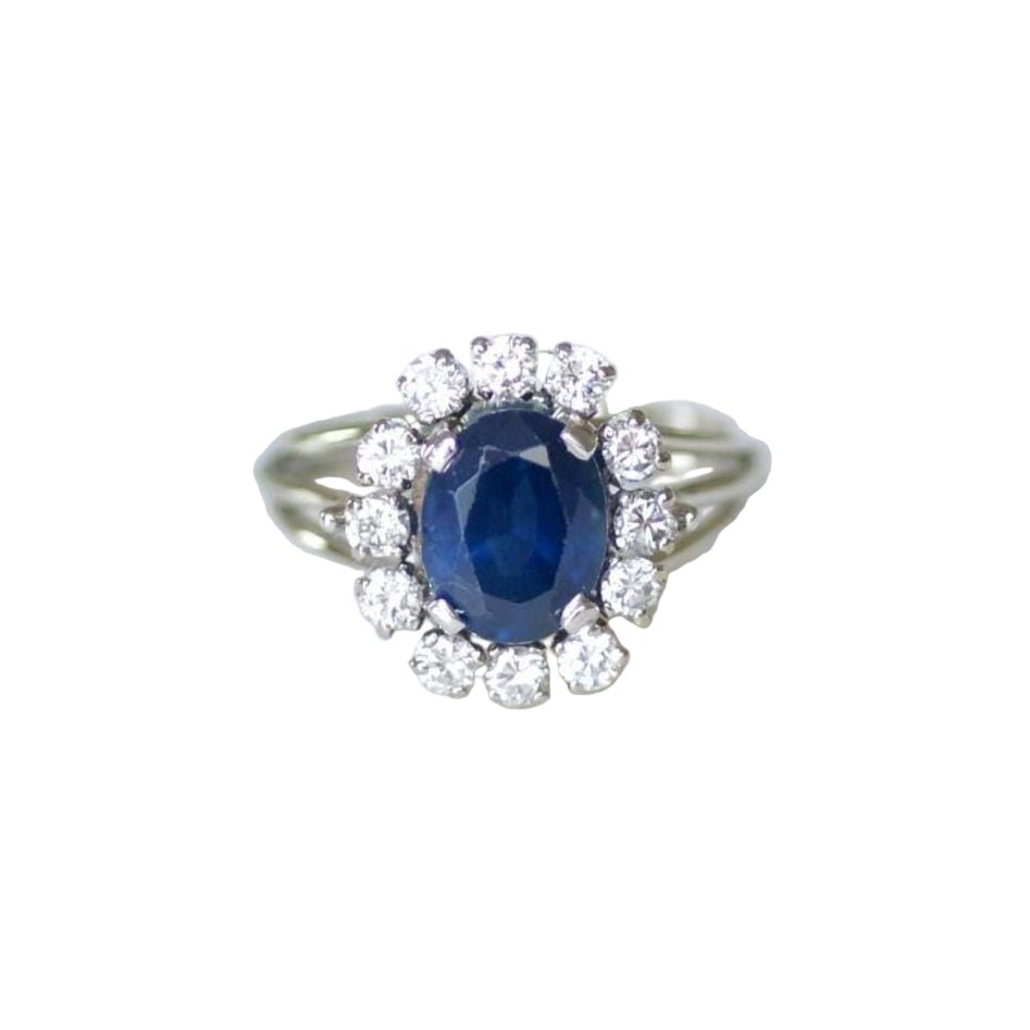 Bague Marguerite en or blanc, platine, saphir et diamants - Castafiore