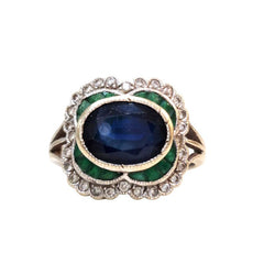 Bague Marguerite en or blanc, saphir, émeraudes, diamants - Castafiore