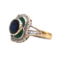 Bague Marguerite en or blanc, saphir, émeraudes, diamants - Castafiore