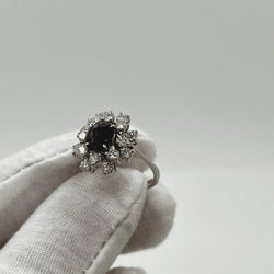 Bague marguerite en or blanc saphir et diamants - Castafiore