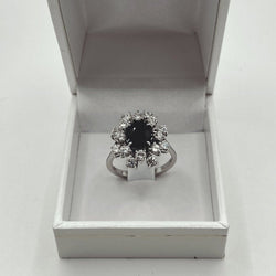 Bague marguerite en or blanc saphir et diamants - Castafiore