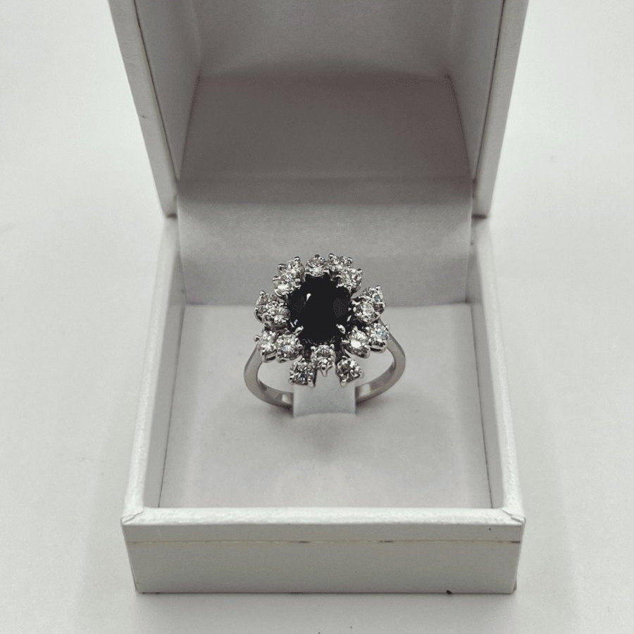 Bague marguerite en or blanc saphir et diamants - Castafiore