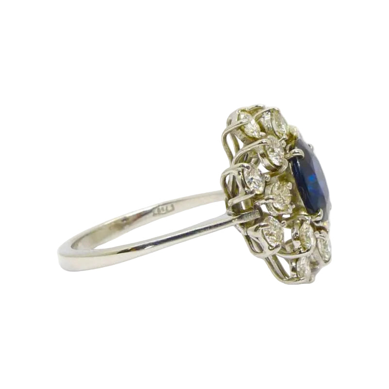 Bague marguerite en or blanc saphir et diamants - Castafiore