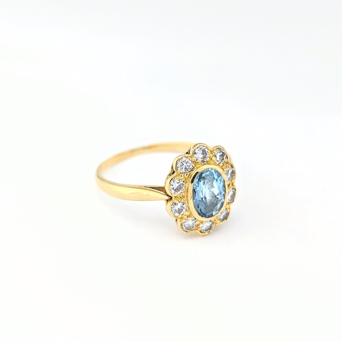 Bague Marguerite en or jaune diamants et aigue - marine - Castafiore