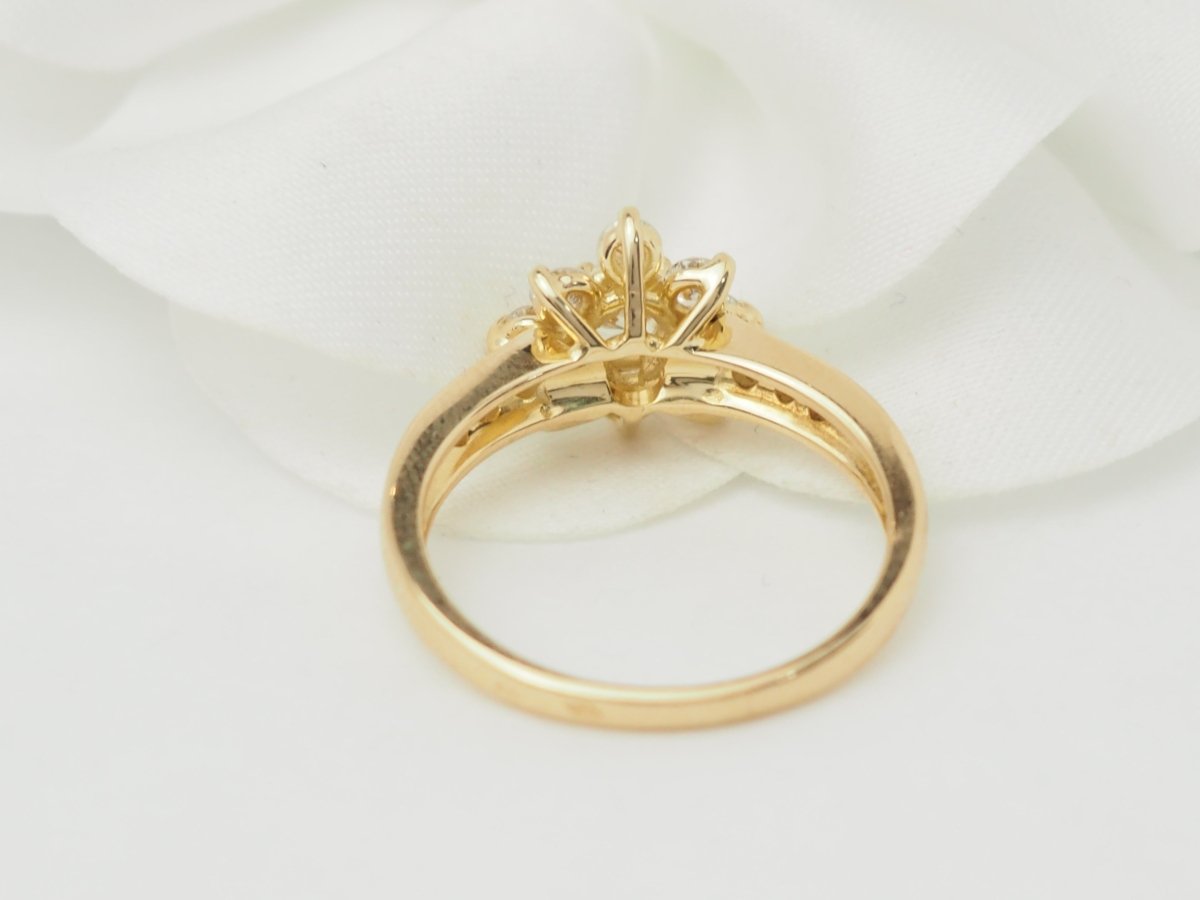 Bague marguerite en or jaune et diamants - Castafiore