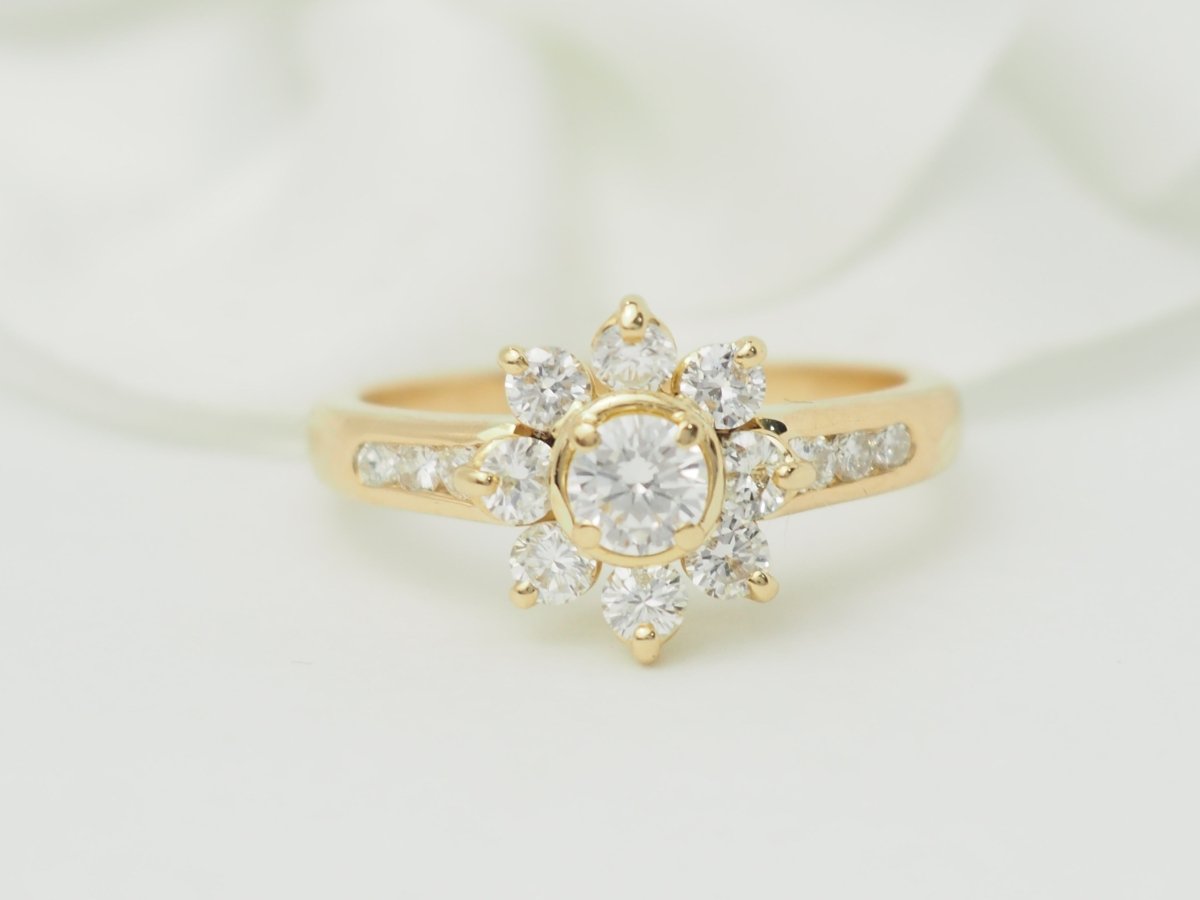 Bague marguerite en or jaune et diamants - Castafiore