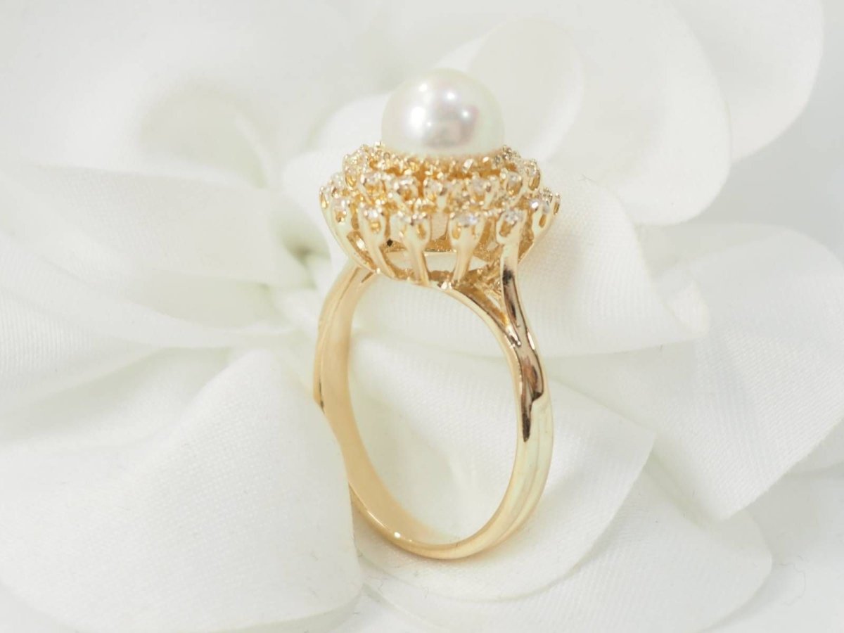 Bague marguerite en or jaune et perle de culture - Castafiore