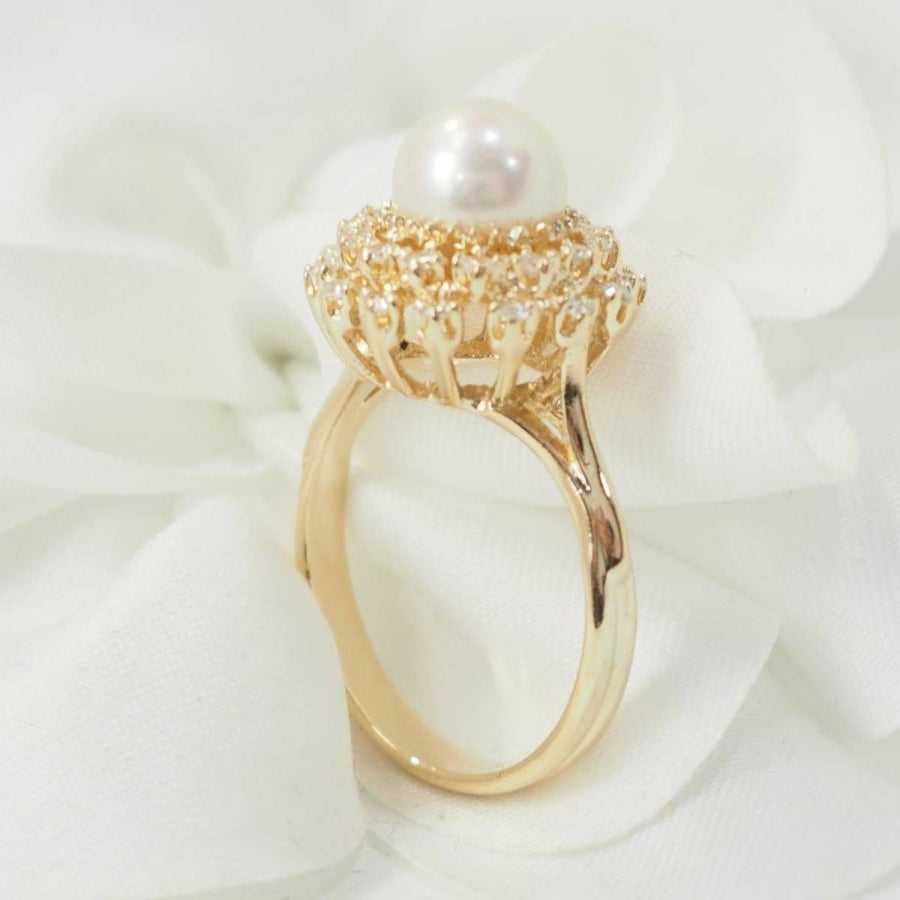 Bague marguerite en or jaune et perle de culture - Castafiore