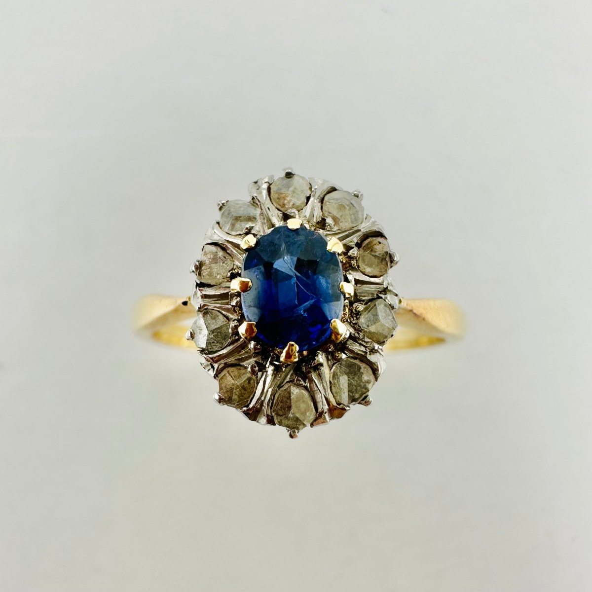 Bague Marguerite en or jaune, or blanc, saphir et diamants - Castafiore