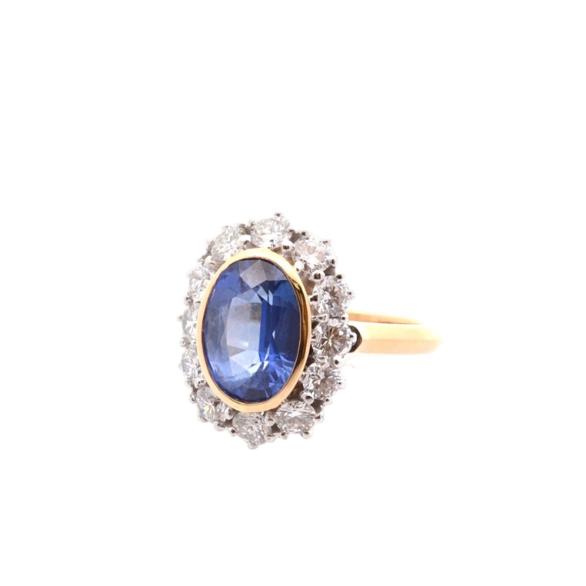 Bague Marguerite en or jaune, platine, saphir, et diamants - Castafiore