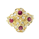 Bague marguerite en or jaune, rubis et diamants - Castafiore