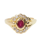 Bague marguerite en or jaune, rubis et diamants - Castafiore