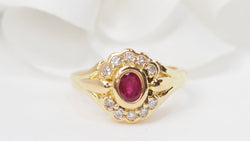 Bague marguerite en or jaune, rubis et diamants - Castafiore