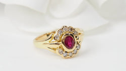 Bague marguerite en or jaune, rubis et diamants - Castafiore