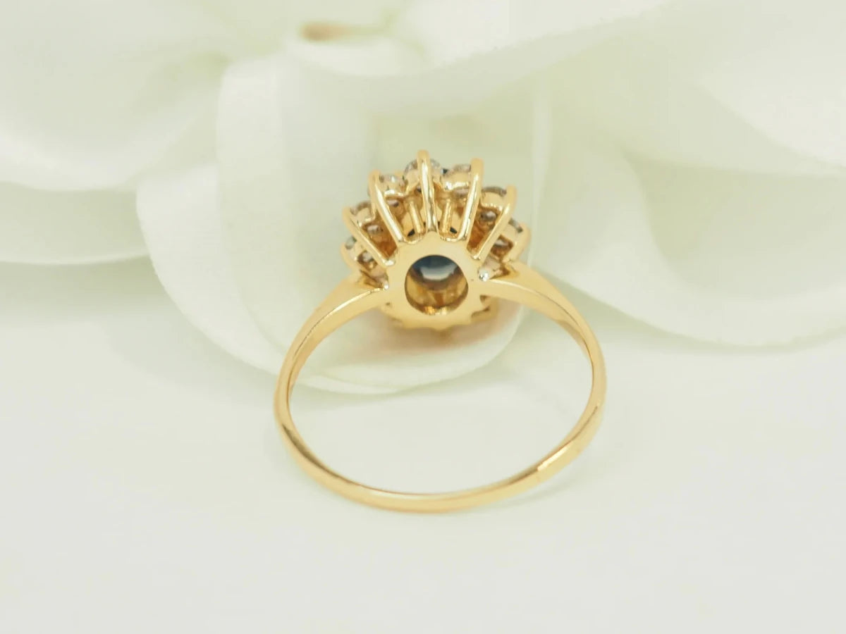 Bague Marguerite en or jaune, saphir et diamants - Castafiore