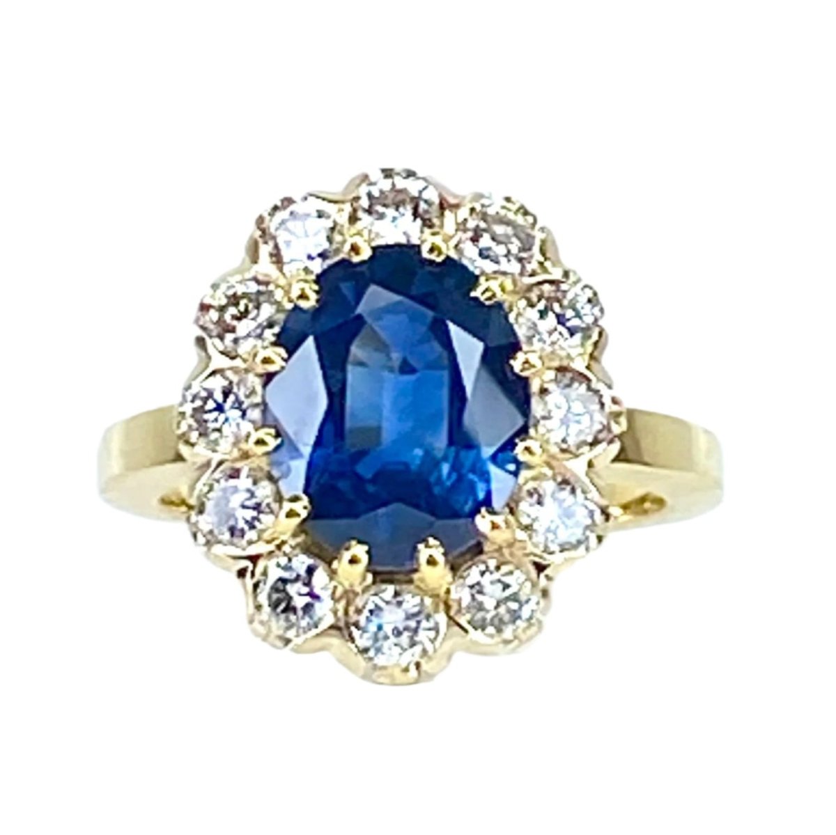 Bague marguerite en or jaune, saphir et diamants - Castafiore