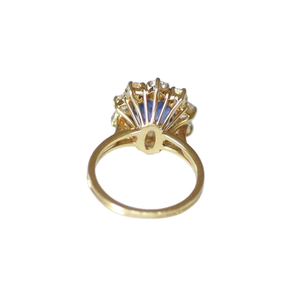 Bague Marguerite en or jaune, saphir, et diamants - Castafiore