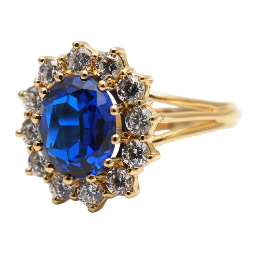 Bague Marguerite en or jaune, saphir et zirconiums - Castafiore