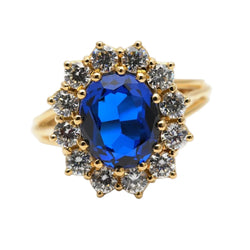 Bague Marguerite en or jaune, saphir et zirconiums - Castafiore