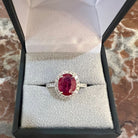 Bague Marguerite en or, rubis et diamants. - Castafiore