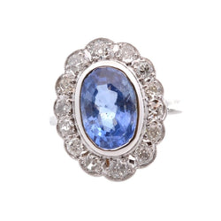 Bague Marguerite en platine, or jaune, saphir, et diamants - Castafiore