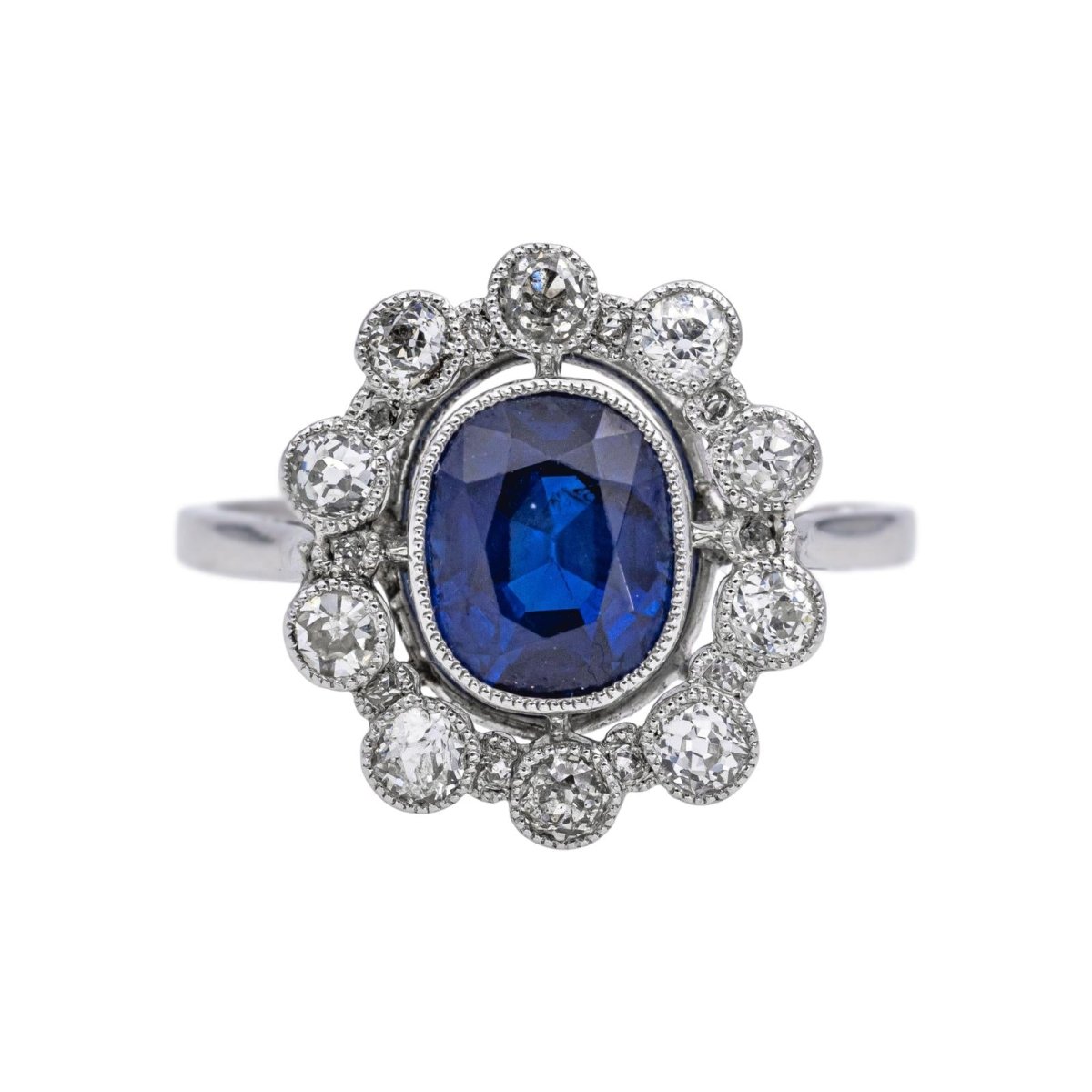 Bague Marguerite en platine, saphir et diamants - Castafiore