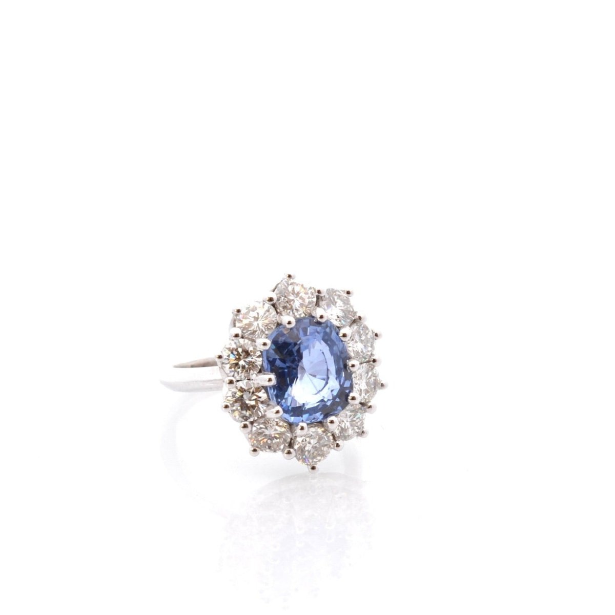 Bague Marguerite en platine, saphir et diamants - Castafiore
