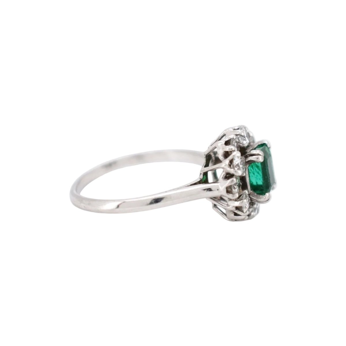 Bague Marguerite MELLERIO en platine, émeraude et diamants - Castafiore