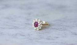 Bague marguerite rubis entourage diamants - Castafiore
