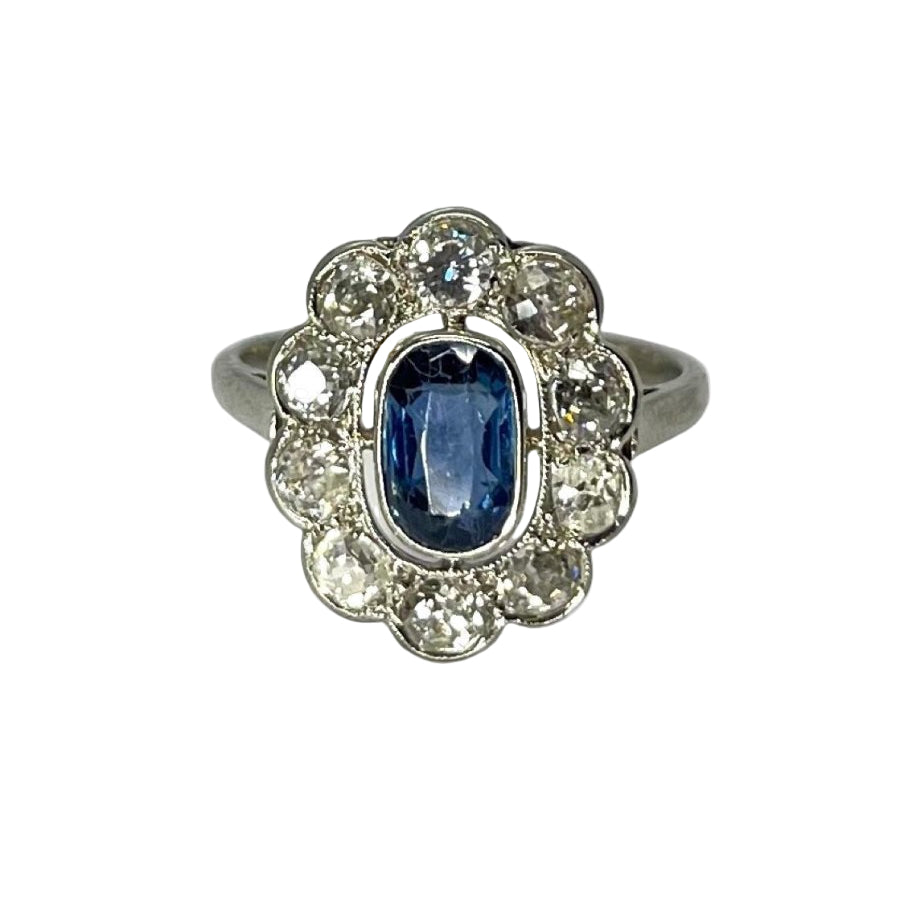 Bague marguerite vintage en or blanc saphir et diamants - Castafiore