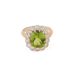 Bague Margueritte ornée d'un péridot, entouré de diamant - Castafiore