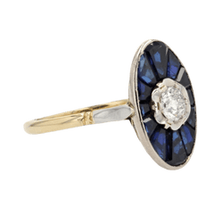 Bague Marquise en or jaune, or blanc, saphirs et diamant - Castafiore