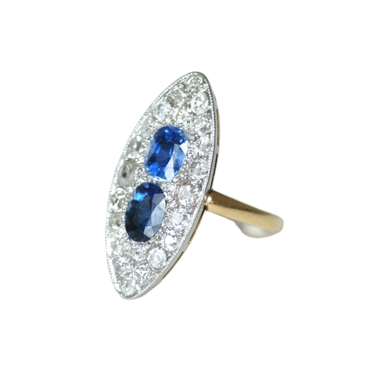 Bague Marquise en or jaune, platine, saphirs et diamants - Castafiore