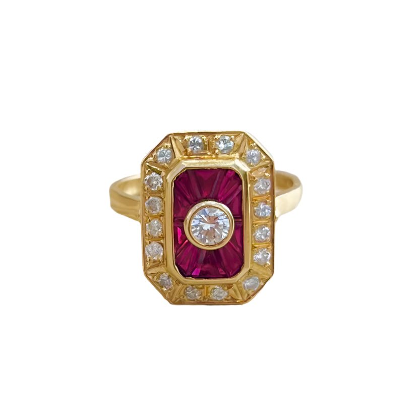 Bague Marquise en or jaune, rubis et diamants - Castafiore