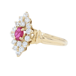 Bague Marquise en or jaune, rubis et diamants - Castafiore