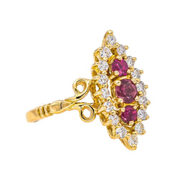 Bague Marquise en or jaune, rubis et diamants - Castafiore