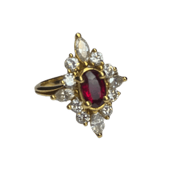 Bague Marquise en or jaune, rubis et diamants - Castafiore