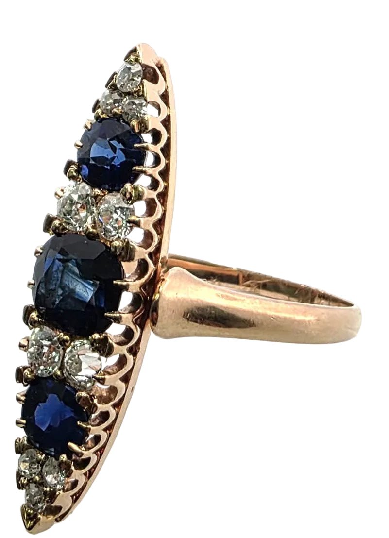 Bague Marquise en or jaune, saphirs et diamants - Castafiore