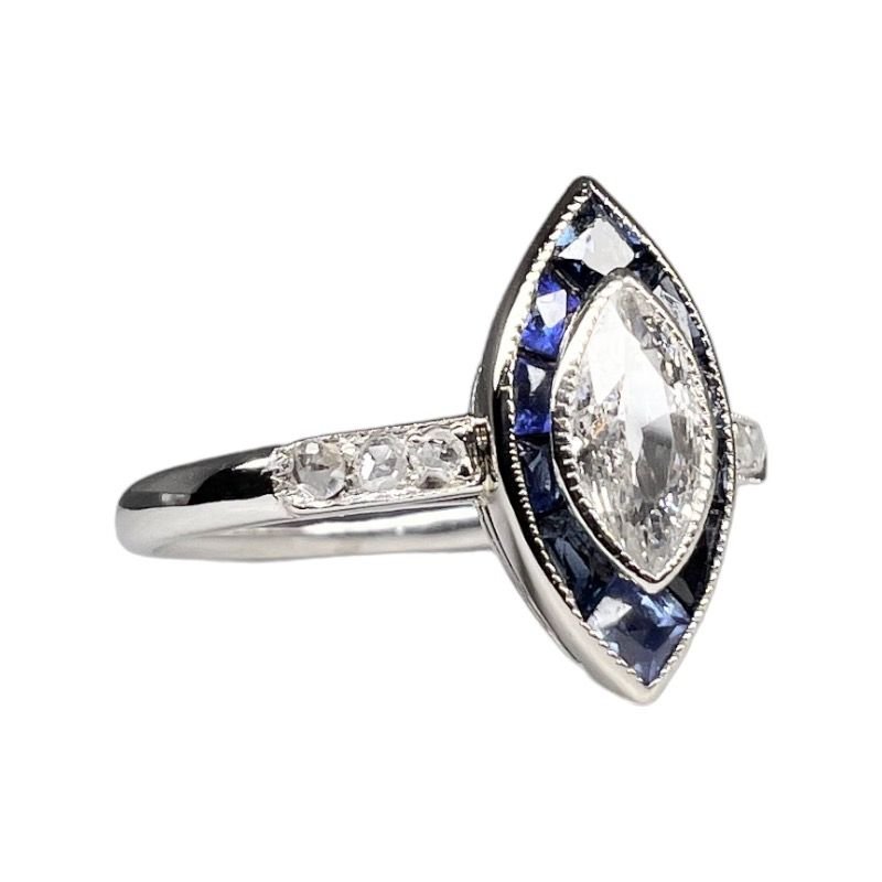 Bague Marquise en platine, diamants et saphirs - Castafiore