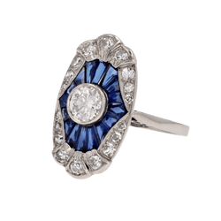 Bague Marquise en platine, saphirs et diamants - Castafiore