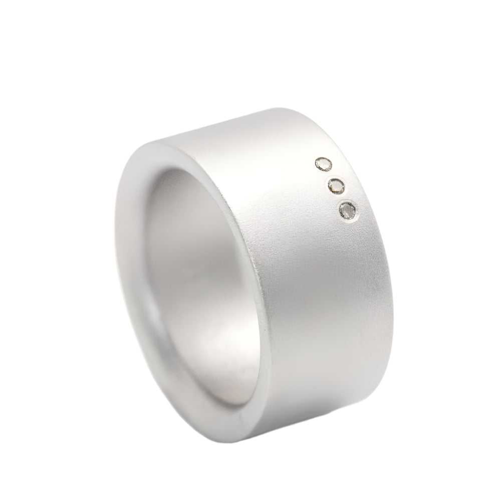 Bague NIESSING en acier et diamants - Castafiore