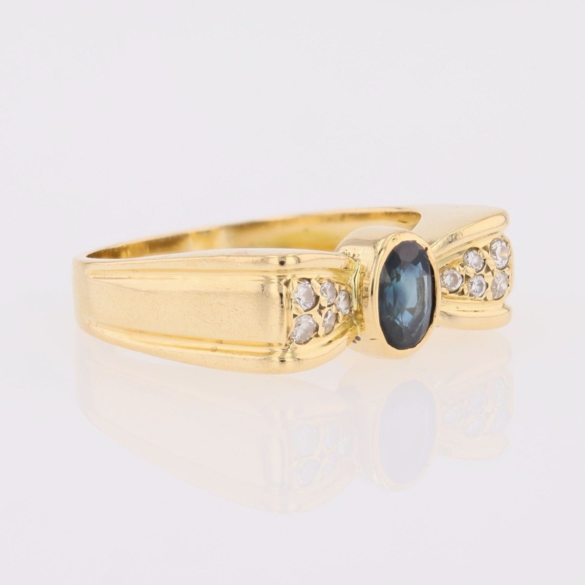 Bague nœud en or jaune saphir et diamants - Castafiore